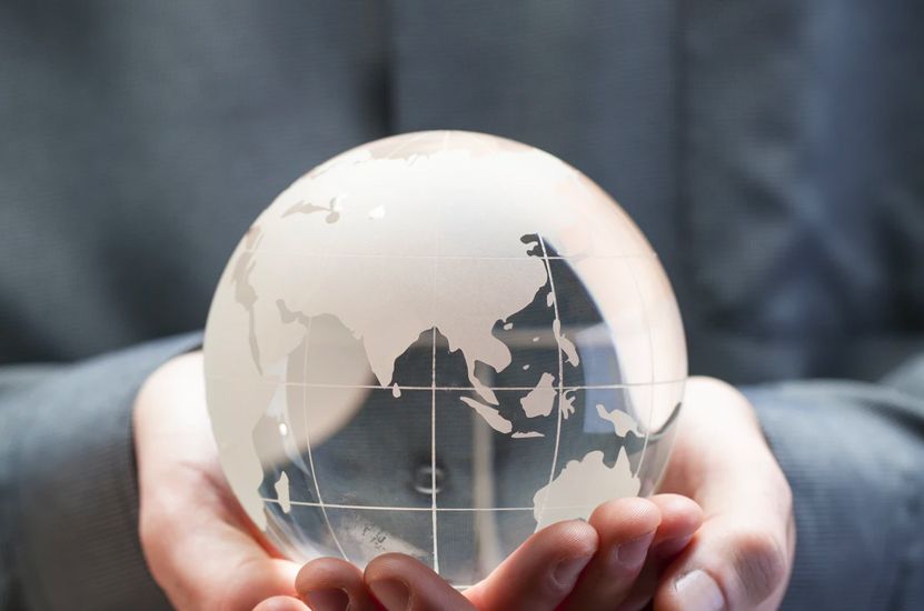 World Globe in Hands CLose-up World Globe in Hands Close-up